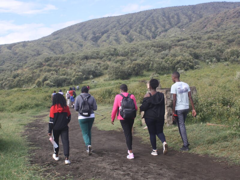 Family enjoying a Mt Longonot hiking day trip at the crater rim
